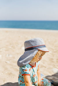 Low section of child on beach