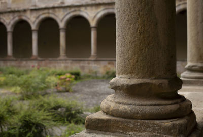 Close-up of old temple against building