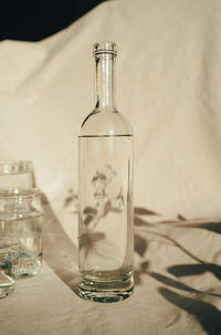 Close-up of glass jar on table