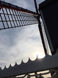 Low angle view of building against cloudy sky