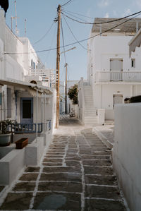 View of alley amidst houses
