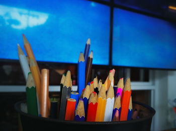 Close-up of multi colored pencils on table