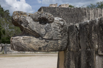 Close-up of old statue kukulcan