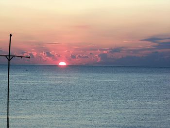 View of calm sea at sunset