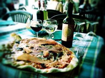 Close-up of pizza in glass on table