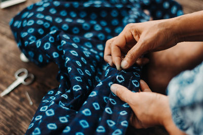 High angle view of woman holding hands