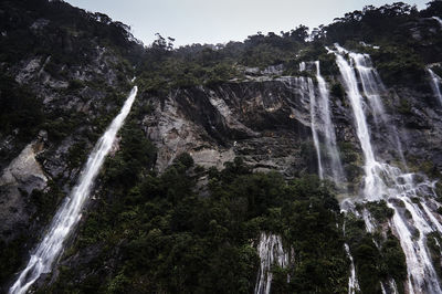 Low angle view of waterfalls at te anau