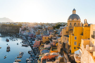 The warm light of the sun illuminates procida