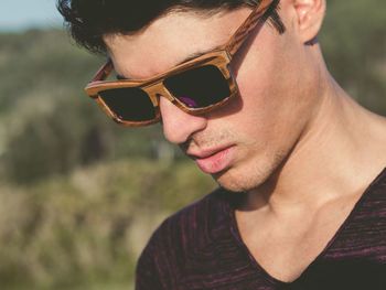 Close-up of young man wearing sunglasses