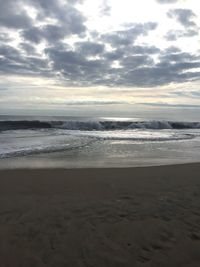 Scenic view of beach against sky