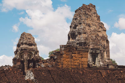 Old temple building against sky