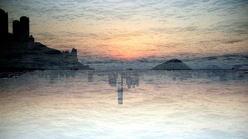 Scenic view of sea at sunset