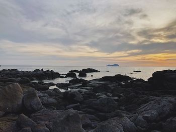 Scenic view of sea against sky during sunset