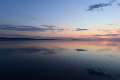 Twilight blue sky in the silence of a summer evening over calmness water lake