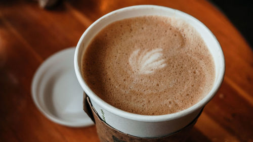 High angle view of cappuccino on table