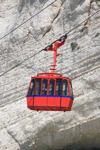 A single red cable car