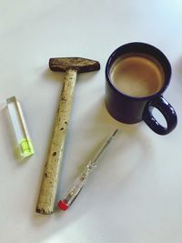 High angle view of coffee cup on table