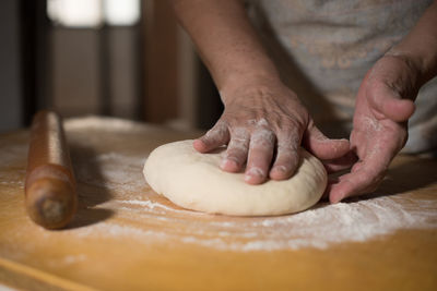 Close-up of person preparing food