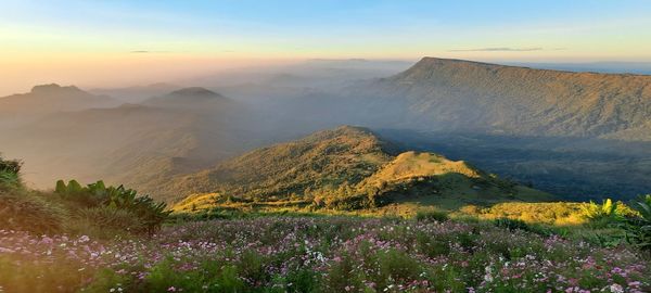 Scenic view of mountains against sky during sunset