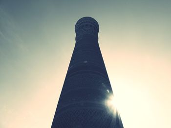 Low angle view of building against sky during sunset