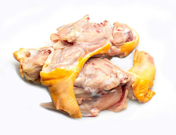 High angle view of meat on white background