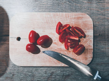 High angle view of chopped tomatoes on cutting board