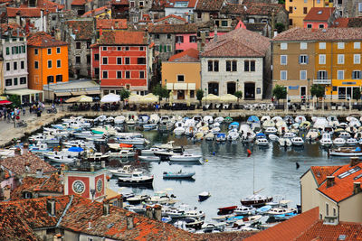 High angle view of boats moored at harbor