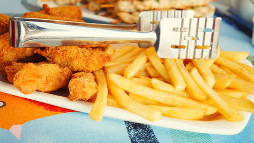 Close-up of fast food in plate