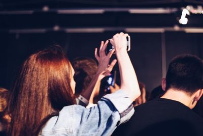 Rear view of people at music concert