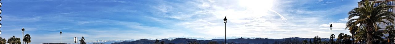 Low angle view of panoramic shot of mountains against sky