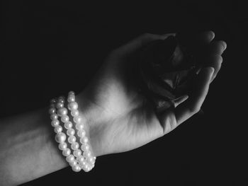 Close-up of flower over black background