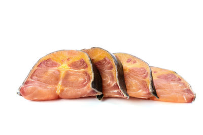 Close-up of bread against white background