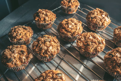 High angle view of muffins on rack