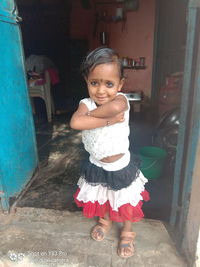 Portrait of cute girl standing outdoors