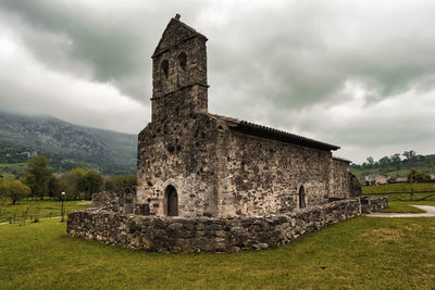 Low angle view of old building against sky