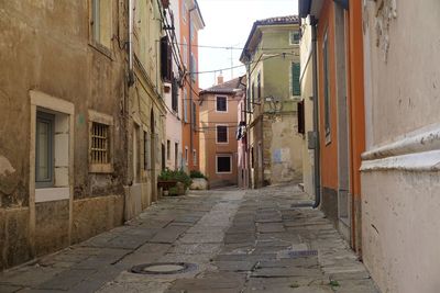 Narrow alley along buildings