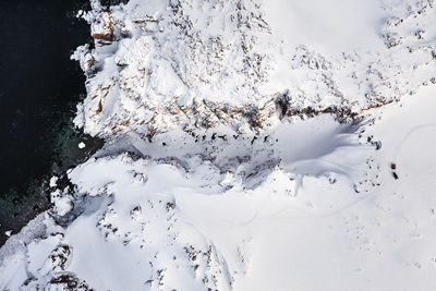 High angle view of snow covered trees against sky