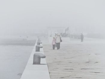 Woman in foggy weather