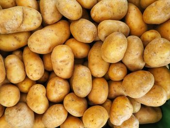 Full frame shot of potatos for sale at market