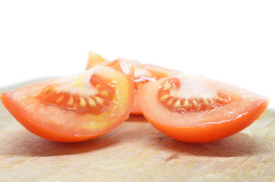 Close-up of orange slices on table