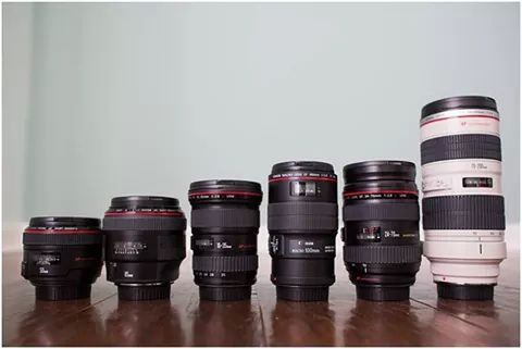 indoors, side by side, copy space, in a row, bottle, still life, reflection, glass - material, no people, built structure, container, architecture, red, arrangement, close-up, auto post production filter, table, order, wall - building feature, day