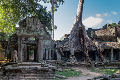 Old temple building against sky