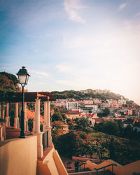 Buildings in town against sky