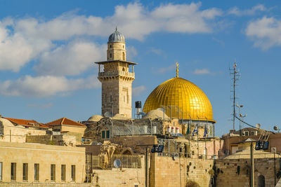 Cathedral of buildings against sky