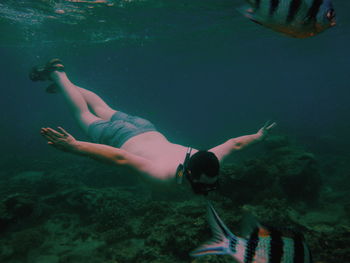 Man swimming in sea