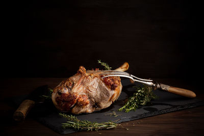 Close-up of meat on cutting board