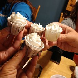 Midsection of woman holding ice cream