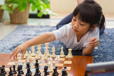 Full length of a girl playing on landscape