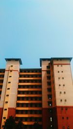 Low angle view of buildings against clear sky