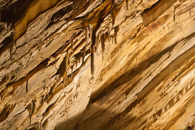 Full frame shot of rock formation with stalactites